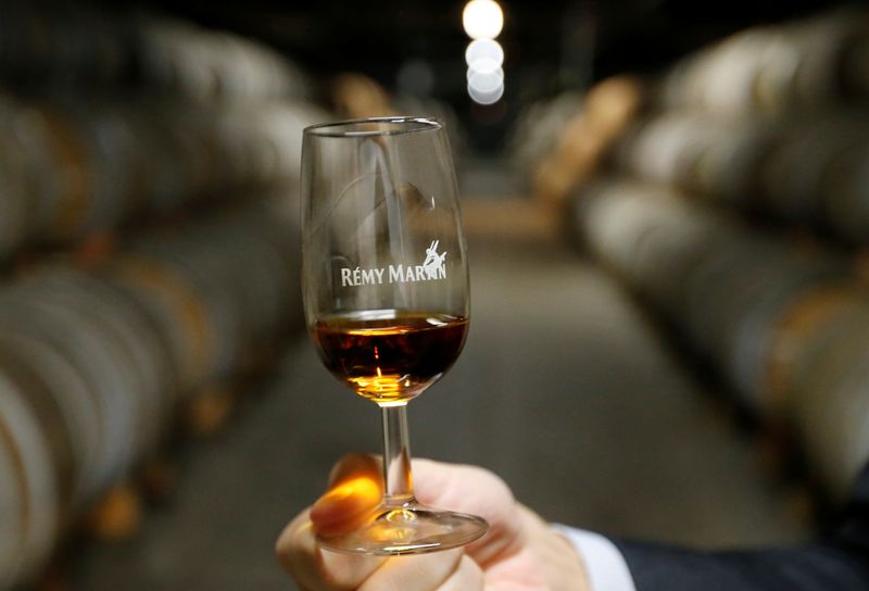 © Reuters. FILE PHOTO: A man tests Cognac in a cellar at the Remy Martin factory in Cognac, France, November 21, 2018. REUTERS/Regis Duvignau/File Photo