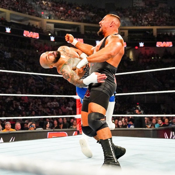 WWE superstars Bron Breakker hits Ricochet with a clotheslines during their match on Monday Night Raw