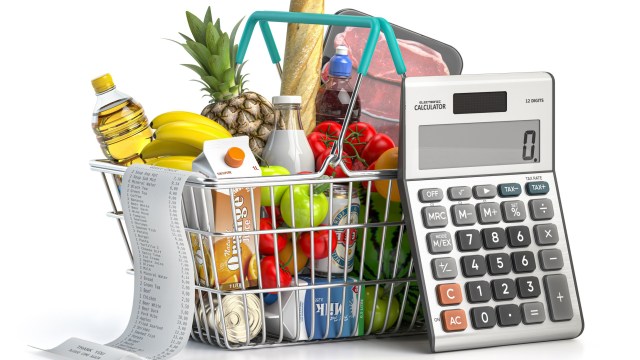 Shopping cbasket full of grocery food with receipt and calculator isolated on white. Home budget, savings, inflation and consumerism concept. 3d illustration