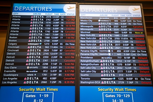 ORLANDO, FLORIDA - JULY 19: Departure monitors show cancelled and delayed flights due to the global communications outage caused by CrowdStrike at Orlando International Airport on July 19, 2024, in Orlando, Florida. Businesses and airlines worldwide continue to be affected by a global technology outage attributed to a software update administered by CrowdStrike, a cybersecurity firm whose software is used by various industries around the world. (Photo by Miguel J. Rodriguez Carrillo/Getty Images)